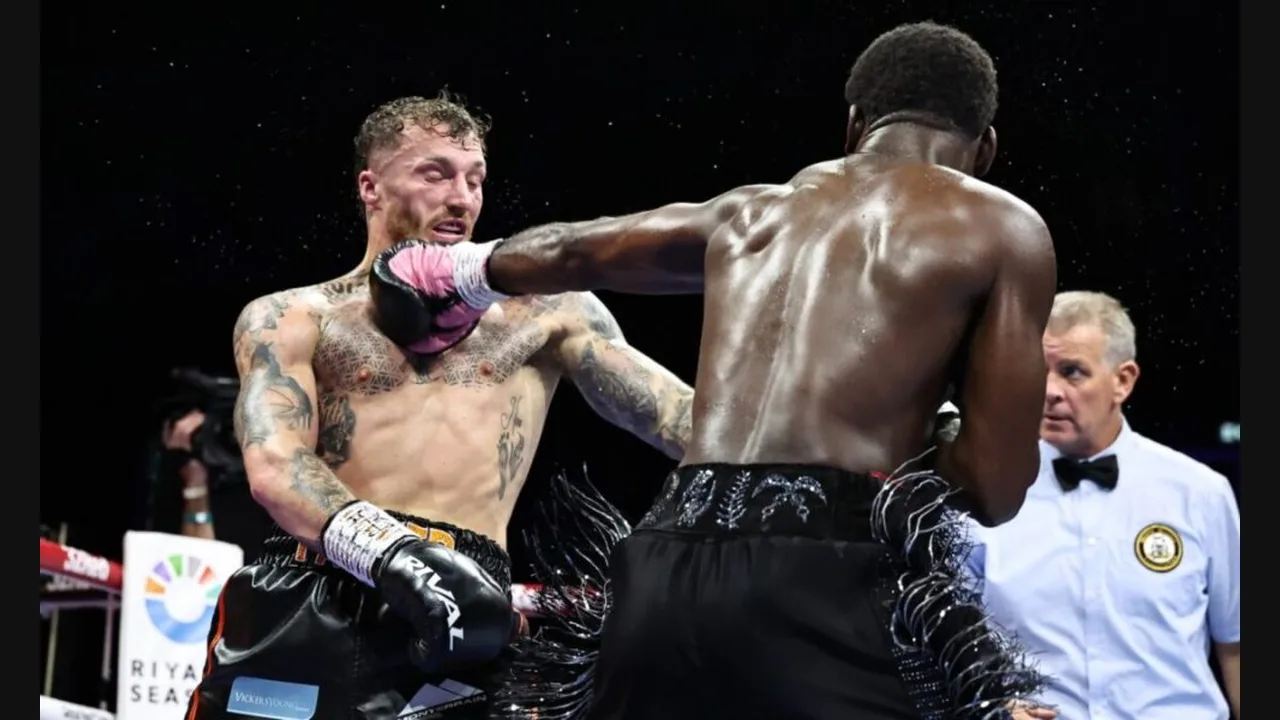 Photograph of a boxer landing a punch on his opponent in the ring as the referee watches